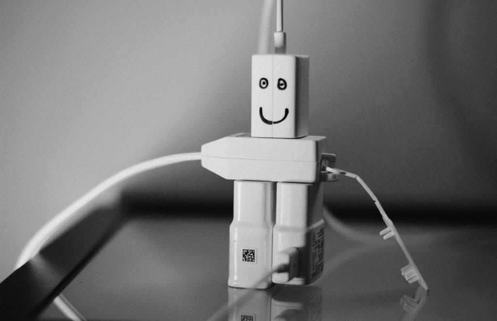 A miniature robot that shows wires connecting to it.